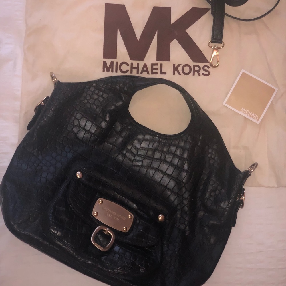 Michael Kors Black leather medium purse.